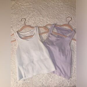 Two Lululemon Ebb To Street Crop Tanks